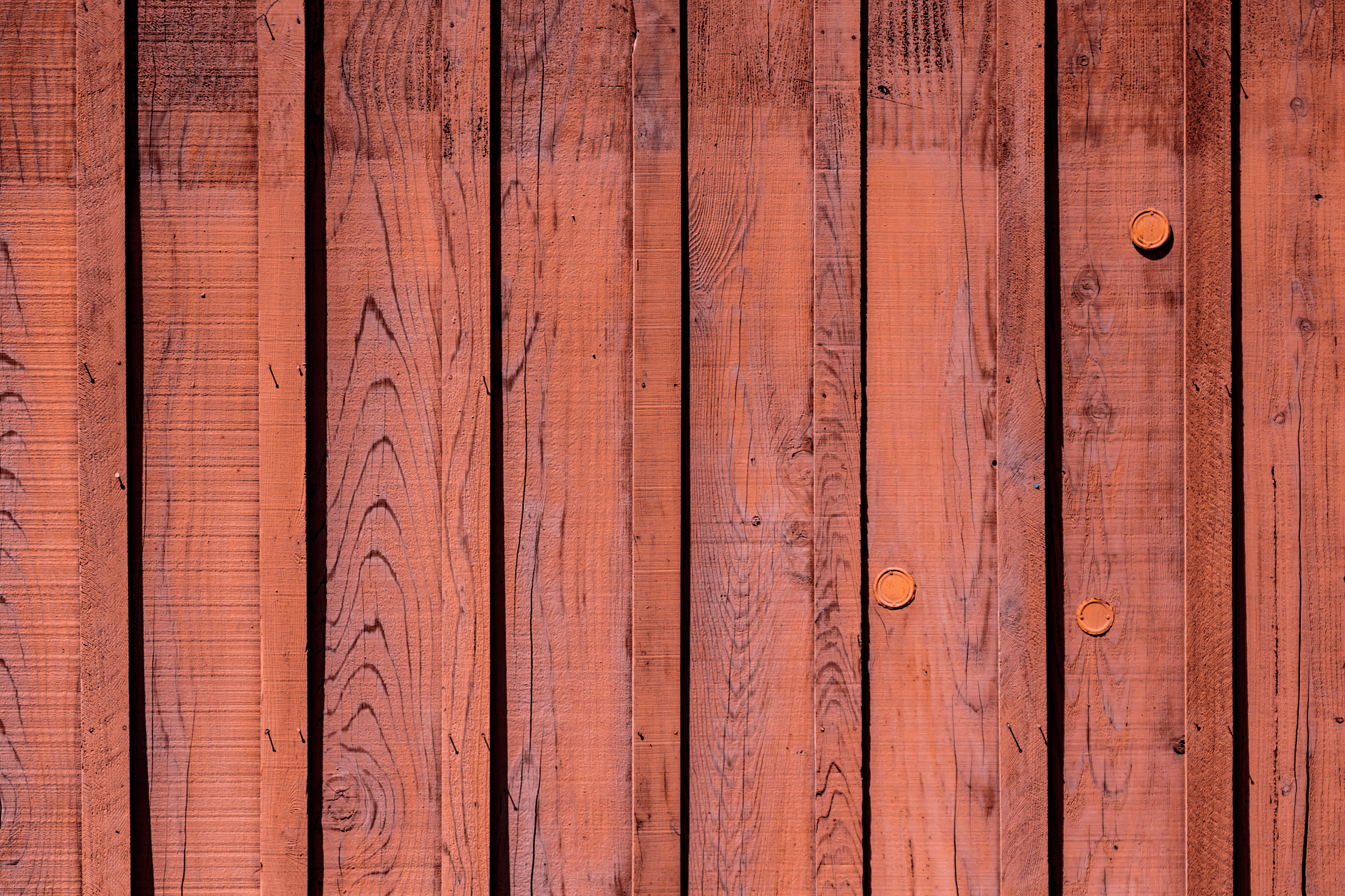 Fence staining by Bing's Painting Plus in Ocala, FL — evenly stained wood fence line