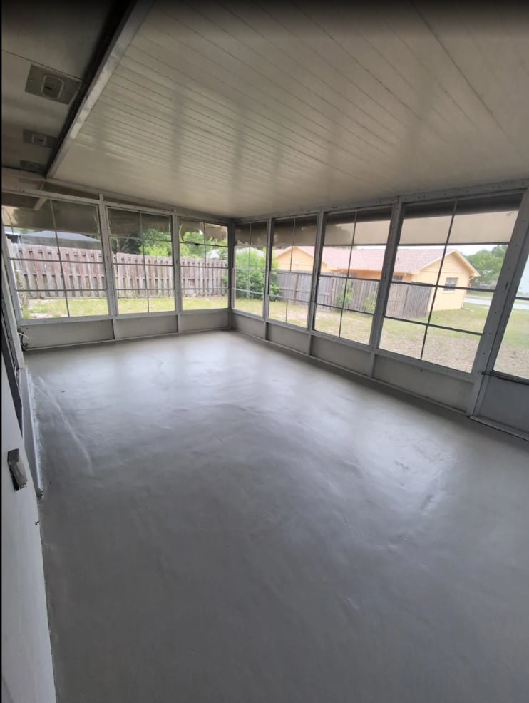 Screened back lanai with a concrete floor coated in H&C ColorTop in Ocala, FL