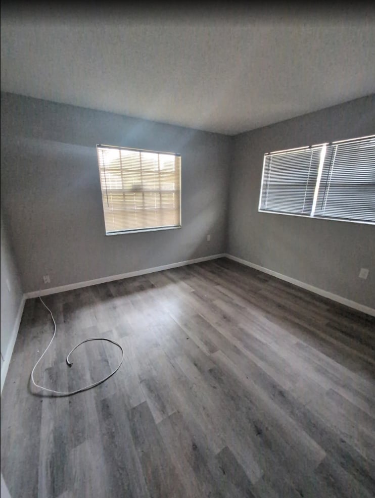 Freshly painted gray room with white baseboards in an Ocala, FL home